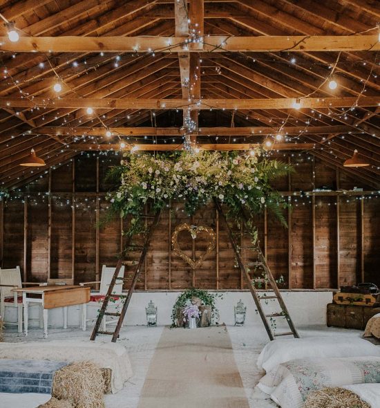 Rustic wedding ceremony arch